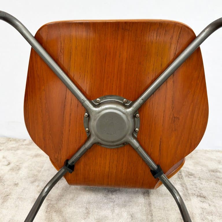 Pair of 1950s Danish teak plywood chairs by Herbert Hirche for Jofa Stålmøbler, with sculptural moulded seats and original tubular steel frames.